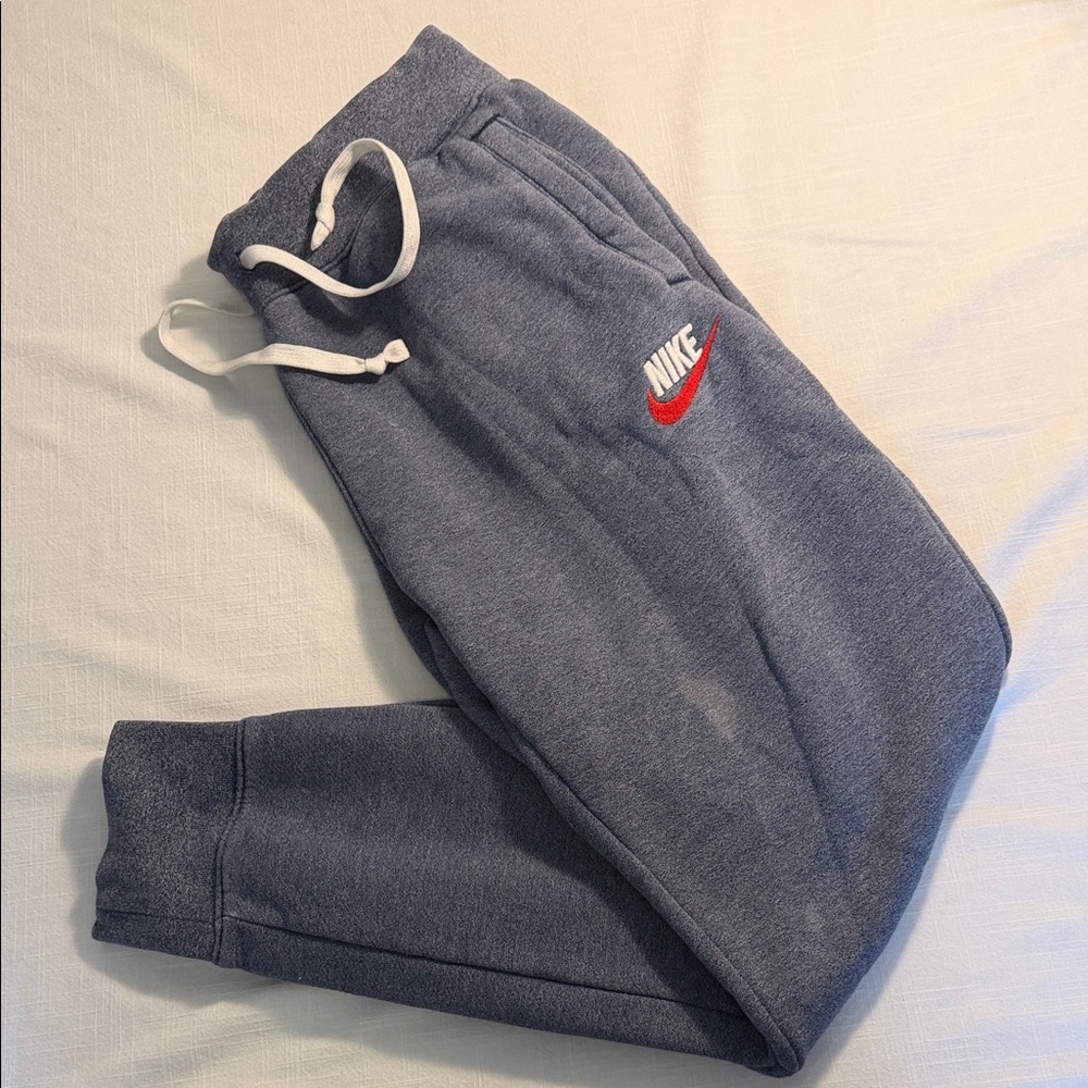 Nike Men's Heather Blue Sweatpants with White Drawstring and Red Swoosh